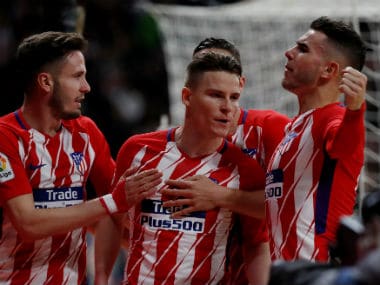 Atletico Madrid's Saul Niguez in action with Real Betis' Jordi Amat. Reuters 