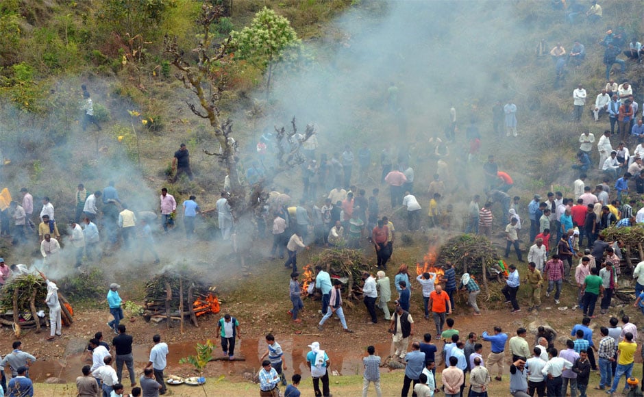 Relatives and family members perform a mass cremation of the school children who were killed in the bus accident. An official said that prima facie, negligent driving and over-speeding appeared to be the primary cause of the accident. PTI Relatives and family members perform a mass cremation of the school children who were killed in the bus accident. An official said that prima facie, negligent driving and over-speeding appeared to be the primary cause of the accident. PTI