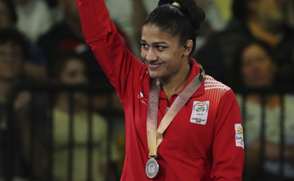 India's Silver medalist in women's FS 53Kg wrestling Babita Kumari waves during a medal ceremony at the Commonwealth Games. AP India's Silver medalist in women's FS 53Kg wrestling Babita Kumari waves during a medal ceremony at the Commonwealth Games. AP