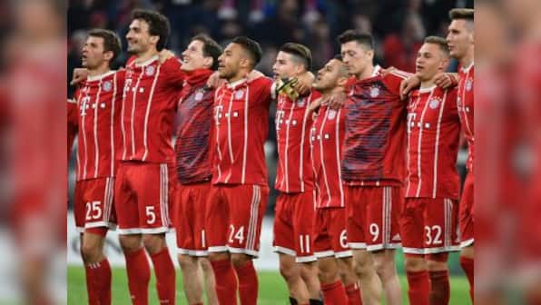 Champions League: Bayern Munich ride on 1st leg victory to reach semis after goalless draw against 10-man Sevilla