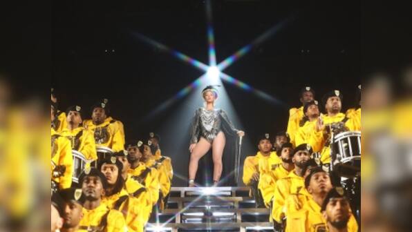 Beyoncé, Solange Knowles suffer onstage fall during Coachella act; sisters laugh off mishap