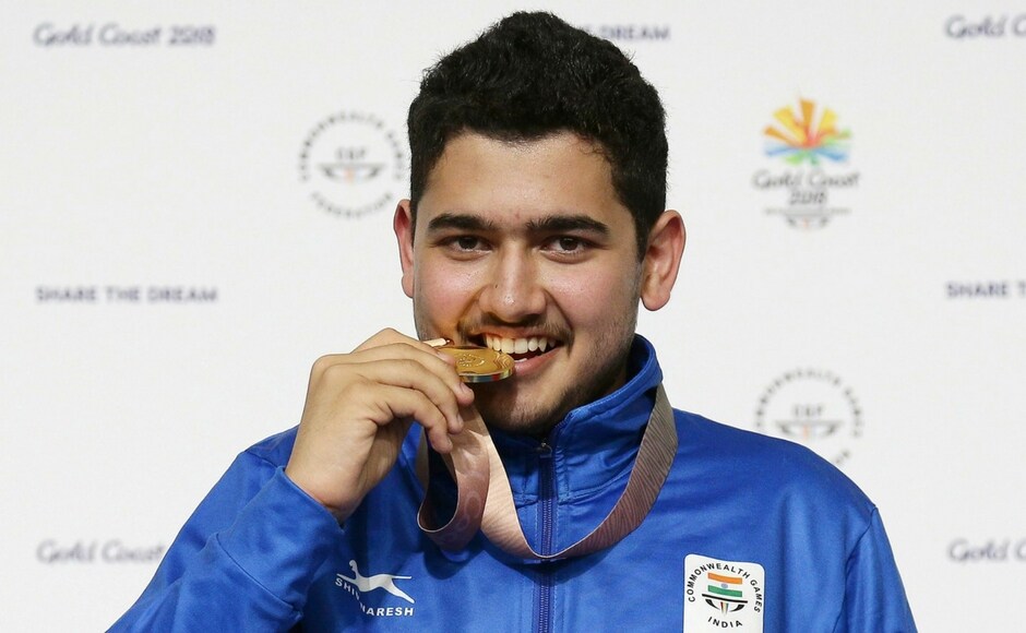Anish Bhanwala of India celebrates with his gold medal at the men's 25m Rapid Fire Pistol final. The 15-year-old is India's youngest-ever CWG gold medallist. PTI Anish Bhanwala of India celebrates with his gold medal at the men's 25m Rapid Fire Pistol final. The 15-year-old is India's youngest-ever CWG gold medallist. PTI