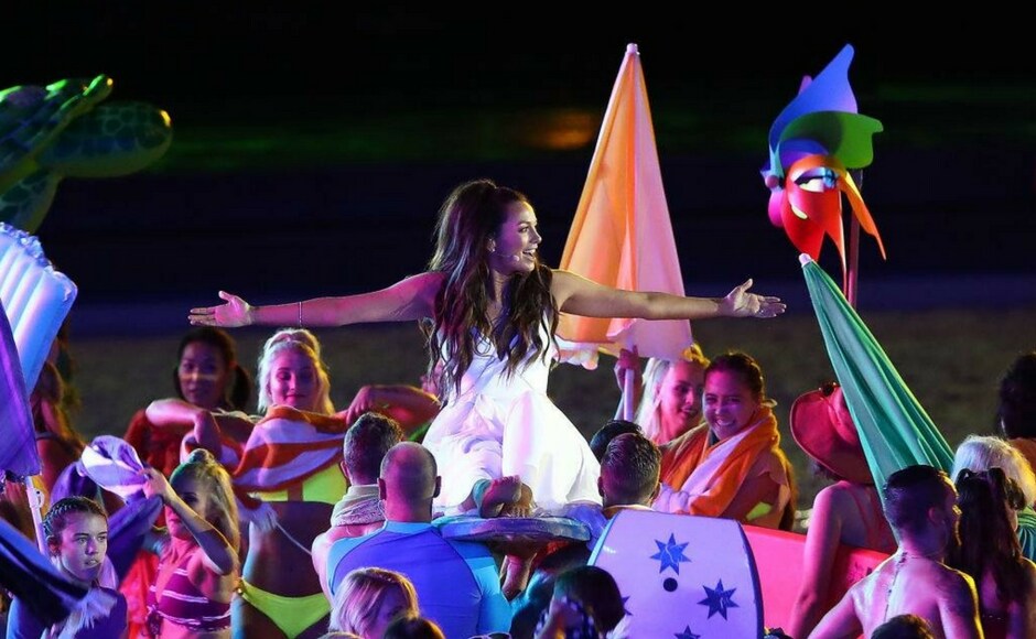 Gold Coast, Australia, a place synonymous with its culture of beaches and celebration depicted the quintessential idea of Queensland through a song and dance performance at the opening ceremony. Image Courtesy: Facebook/GC2018 Gold Coast, Australia, a place synonymous with its culture of beaches and celebration depicted the quintessential idea of Queensland through a song and dance performance at the opening ceremony. Image Courtesy: Facebook/GC2018