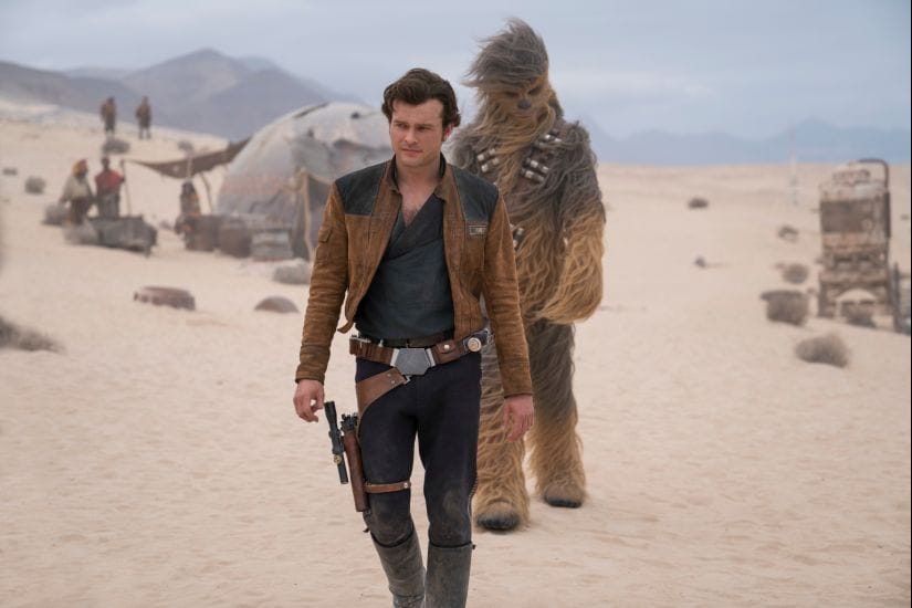 In this image released by Lucasfilm, Alden Ehrenreich and Joonas Suotamo appear in a scene from "Solo: A Star Wars Story," in theaters on May 25. (Jonathan Olley/Lucasfilm via AP)