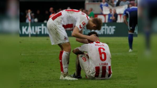 Bundesliga: Cologne on brink of relegation after 2-2 draw with Schalke; Augsburg beat struggling Mainz