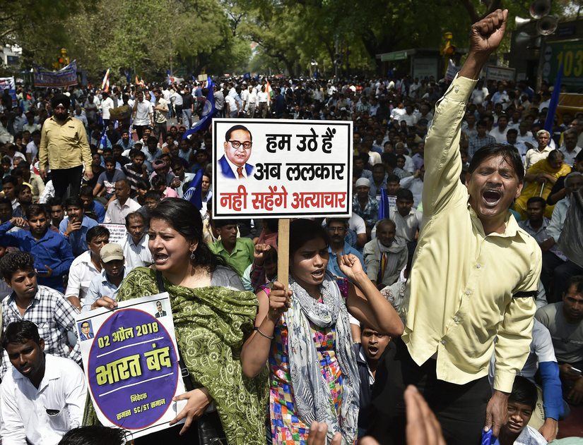 Members of Dalit community raise slogans during 'Bharat Bandh' in New Delhi. PTI