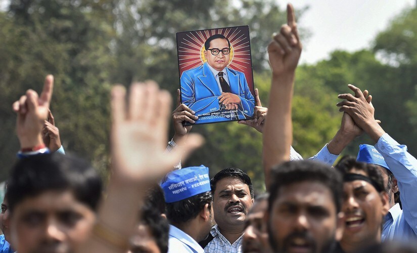 Members of Dalit community raise slogans during 'Bharat Bandh' in New Delhi. PTI