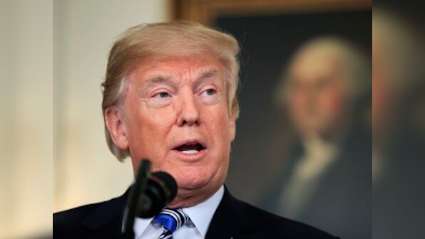 Donald Trump on midterm campaign mode whips up immigration storm; seizes on opponents' glaring social media errors