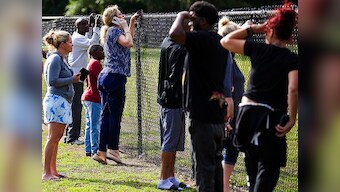19-year-old former student carries gun in guitar case to Florida school, fires at closed door; 1 injured