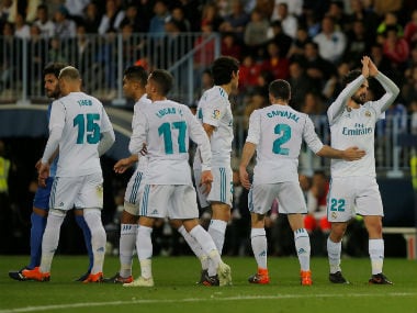 Real Madrid's Isco celebrates scoring their first goal with teammates. Reuters 