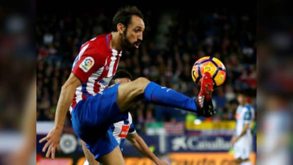 Europa League: Atletico defender Juanfran set to miss both semi-final legs against Arsenal with hamstring injury