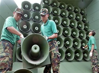 File image of South Korean army soldiers removing loudspeakers used for propaganda near the demilitarised zone between South and North Korea, in Paju, South Korea. AP