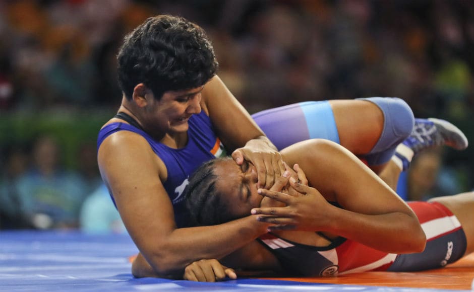 India's Kiran Bishnoi wrestles with Mauritius's Katouskia Pariadhaven to win Bronze medal in women's FS 76Kg wrestling at the Commonwealth Games. AP India's Kiran Bishnoi wrestles with Mauritius's Katouskia Pariadhaven to win Bronze medal in women's FS 76Kg wrestling at the Commonwealth Games. AP