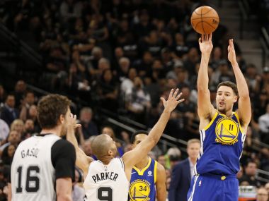 Warriors' Klay Thompson shoots the ball over Spurs point guard Tony Parker in game three. Reuters