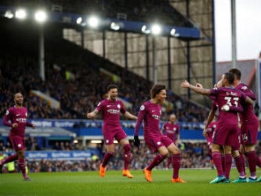 Manchester City's Leroy Sane celebrates scoring their first goal with teammates. Reuters