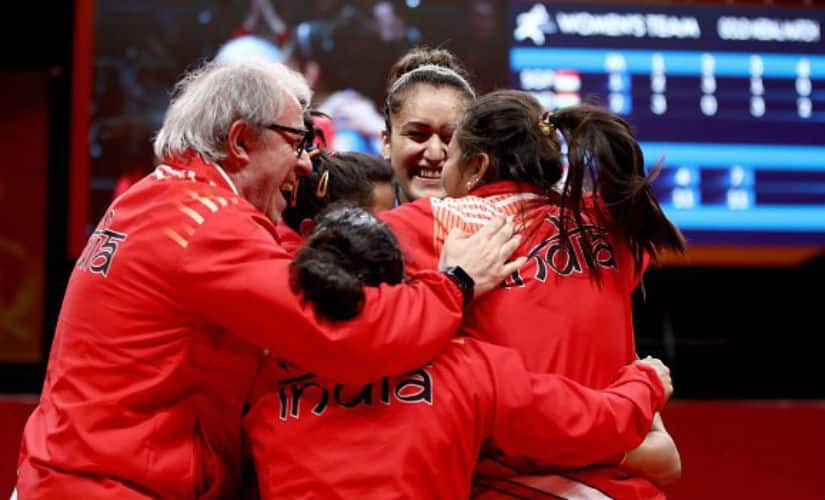Indian women's table tennis team celebrate their win against Singapore. Image Courtesy: Twitter @ioaindia 