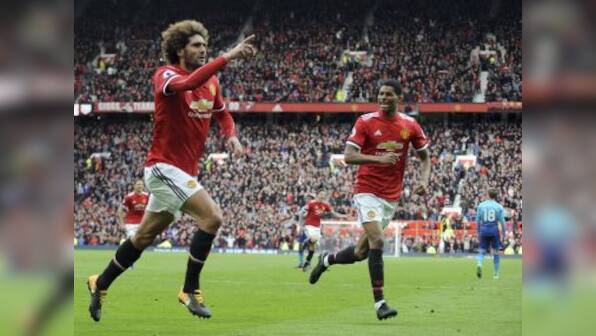 Premier League: Manchester United seal qualification for next season's Champions League with late win over Arsenal