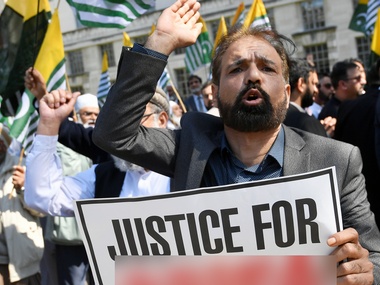 Demonstrations greet Prime Minister Narendra Modi in UK, turn aggressive as Indian Tricolour ripped Demonstrations greet Prime Minister Narendra Modi in UK, turn aggressive as Indian Tricolour ripped