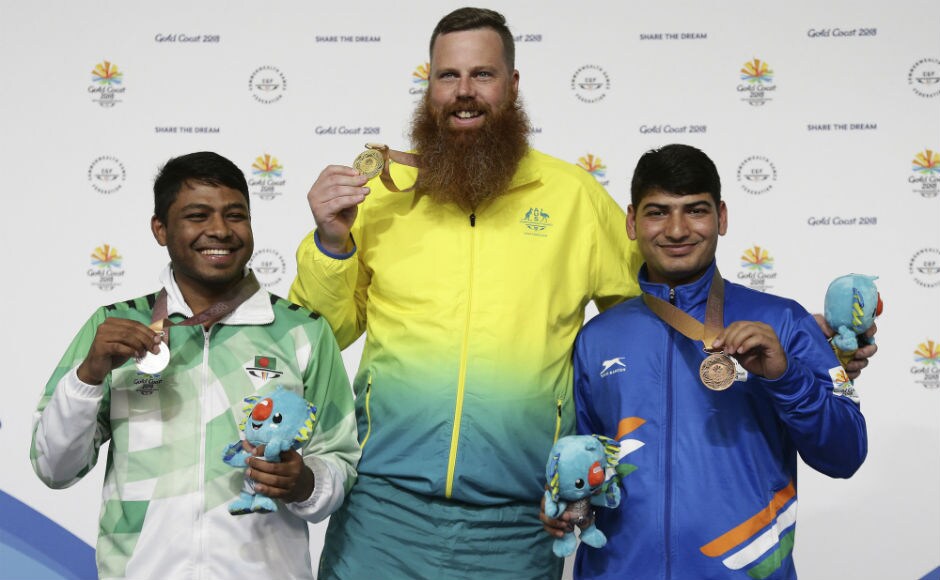 Shakil Ahmed of Bangladesh (L) silver medal, Daniel Repacholi of Australia (C) gold medal, and Om Mitharval of India, bronze medal, during the men's 50m Pistol final. AP Shakil Ahmed of Bangladesh (L) silver medal, Daniel Repacholi of Australia (C) gold medal, and Om Mitharval of India, bronze medal, during the men's 50m Pistol final. AP