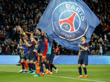 Paris Saint-Germain players celebrate after winning Ligue 1. Reuters