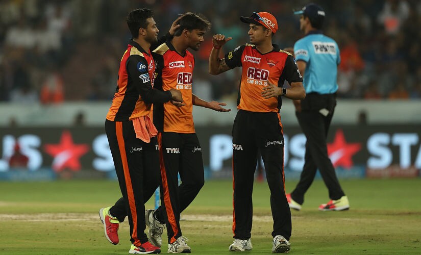 Sunrisers Hyderabad's Sandeep Sharma celebrates fall of wicket with teammates Shakib Al Hasan and Siddharth Kaul. Sportzpics