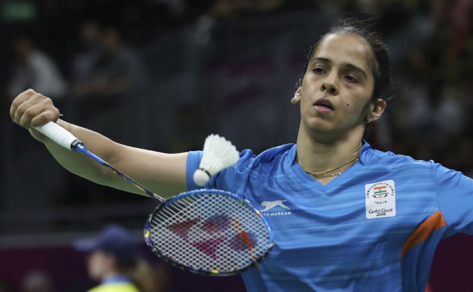 India's Saina Nehwal plays against Elsie de Villiers of South Africa during their women's singles badminton match. AP India's Saina Nehwal plays against Elsie de Villiers of South Africa during their women's singles badminton match. AP