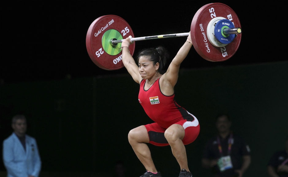 India's Sanjita Chanu competes in the women's 53Kg Weightlifting final during the Commonwealth Games,cin Gold Coast. AP India's Sanjita Chanu competes in the women's 53Kg Weightlifting final during the Commonwealth Games,cin Gold Coast. AP