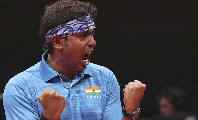 Sharath Kamal roars after winning bronze in men's singles. Reuters