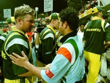 Indian cricketer Sachin Tendulkar (C) shakes hands with Australian cricketers after the Indian victory against Australia in a final match in Sharjah 24 April. AFP