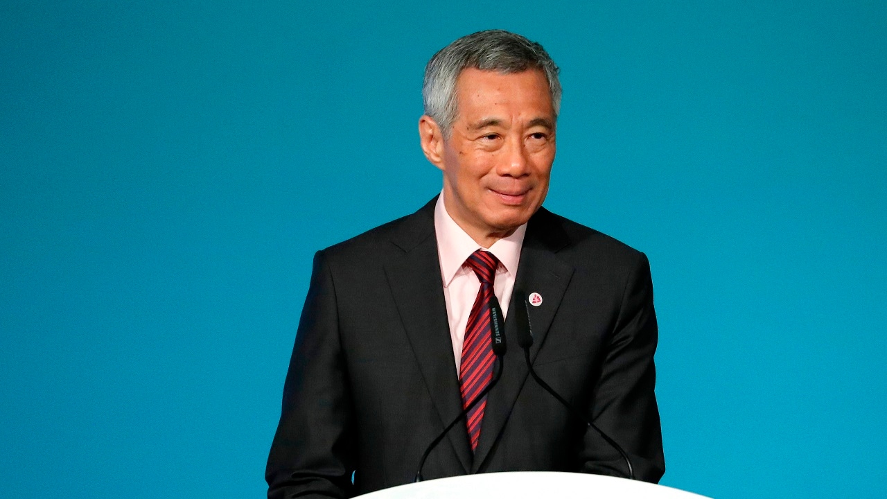 Singapore's Prime Minister Lee Hsien Loong delivers his opening address during the 32nd ASEAN Summit on Saturday, April 28, 2018, in Singapore. (AP Photo/Yong Teck Lim)