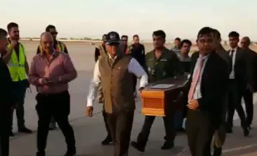 VK Singh carrying one of the coffins to the plane in Baghdad, Iraq. Image courtesy: Twitter@VKSingh