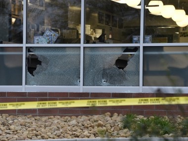 Bullet holes seen at a Waffle House after a fatal shooting in the Antioch neighborhood on Sunday. AP