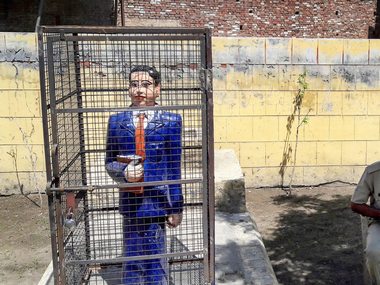 Ambedkar's statue locked in iron cage in Uttar Pradesh's Badaun: Police say they are unaware of people behind act Ambedkar's statue locked in iron cage in Uttar Pradesh's Badaun: Police say they are unaware of people behind act