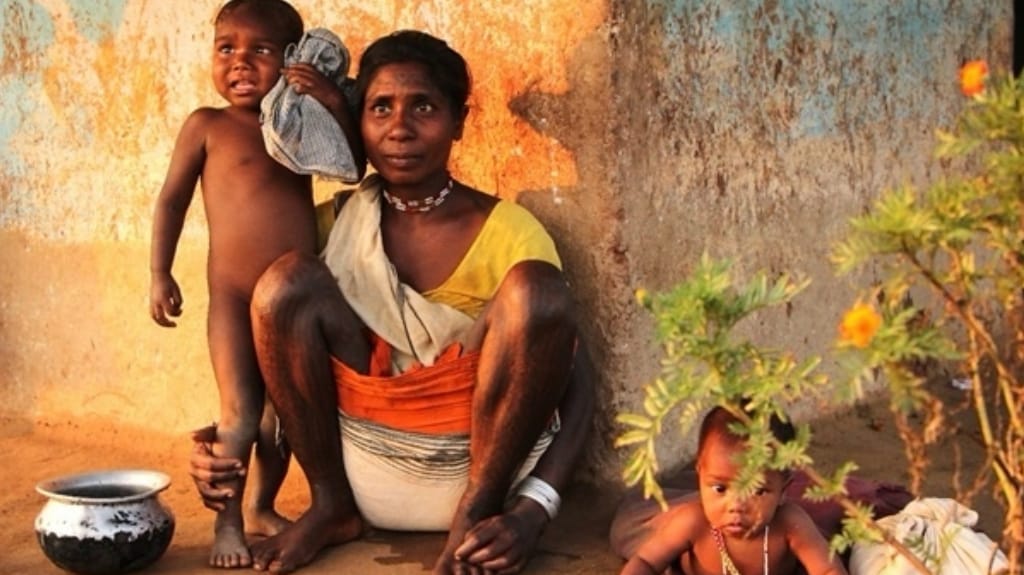 A woman from the Baiga tribe, with her children. PHOTO — Hritu Singh Pawar