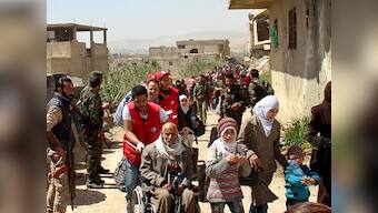 Russia agrees to evacuate civilians from eastern Ghouta as Syrian regime moves to fully retake region