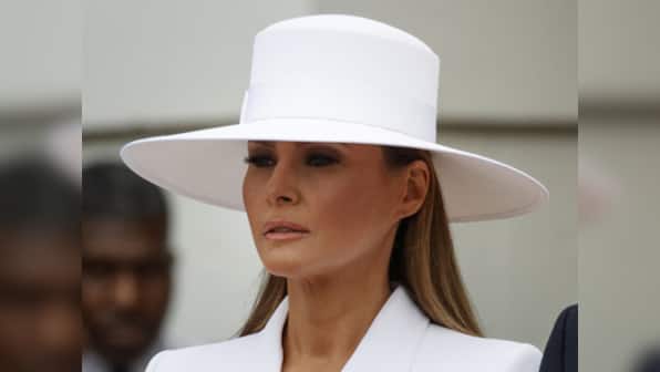Melania Trump greets the Macrons with a wide brim hat, sparking wild Twitter humour