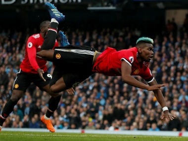 Manchester United's Paul Pogba scores their first goal against Manchester City in the Premier League. Reuters
