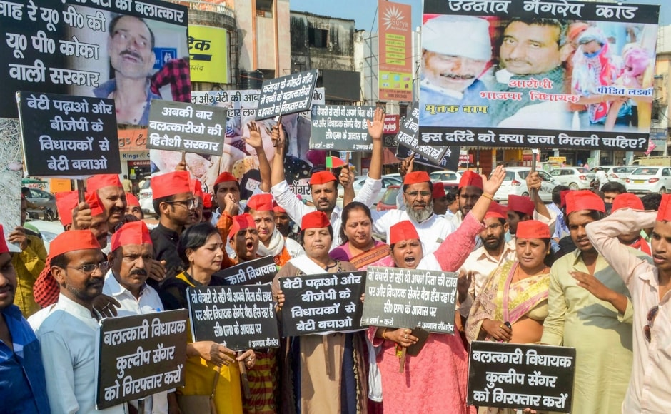 Samajwadi Party activists also raised slogans against the Uttar Pradesh government during a protest over Unnao rape case in Allahabad on Thursday. PTI Samajwadi Party activists also raised slogans against the Uttar Pradesh government during a protest over Unnao rape case in Allahabad on Thursday. PTI