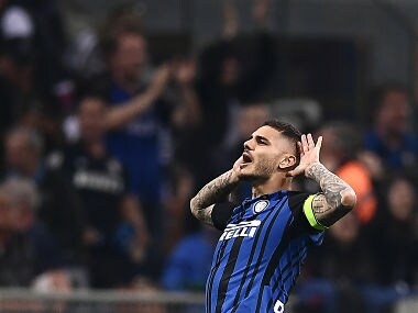 Inter Milan's forward Mauro Emanuel Icardi from Argentina celebrates after scoring during the Italian Serie A football match Inter Milan vs Juventus on April 28, 2018 at the 'San Siro Stadium' in Milan. / AFP PHOTO / MARCO BERTORELLO