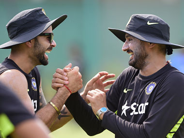 File image of Virat Kohli (L) and Harbhajan Singh. AFP
