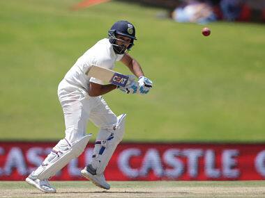 India’s Rohit Sharma plays a shot during the fifth day of the second Test cricket match between South Africa and India at Supersport cricket ground on January 17, 2018 in Centurion, South Africa. / AFP PHOTO / GIANLUIGI GUERCIA