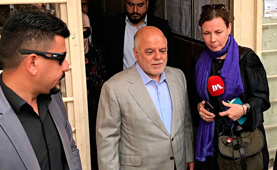 Abadi is considered by analysts to be marginally ahead, but victory is far from certain for the man who raised hopes that he could forge unity when he came to office. Iraq Prime Minister Haider al-Abadi, centre, leaves a polling station after casting his ballot. AP Abadi is considered by analysts to be marginally ahead, but victory is far from certain for the man who raised hopes that he could forge unity when he came to office. Iraq Prime Minister Haider al-Abadi, centre, leaves a polling station after casting his ballot. AP