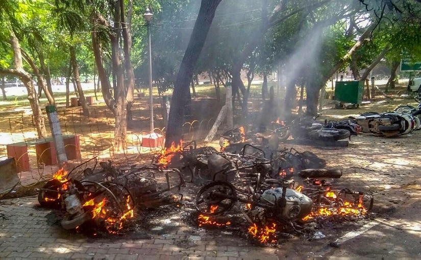 As the violent Anti- Sterlite protest entered the 100th day, vehicles were burned on the road. PTI
