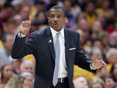Toronto Raptors head coach Dwane Casey gestures against the Cleveland Cavaliers in the first half of Game 4 of an NBA basketball second-round playoff series, Monday, May 7, 2018, in Cleveland. (AP Photo/Tony Dejak)