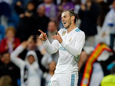 Real Madrid's Gareth Bale celebrates after scoring his side's 2nd goal during a Spanish La Liga soccer match between Real Madrid and Celta at the Santiago Bernabeu stadium in Madrid, Spain, Saturday, May 12, 2018. (AP Photo/Paul White)