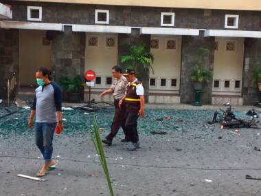 Indonesia church attack: Death toll rises to 11 as series of blasts rock country's second-biggest city Surabaya