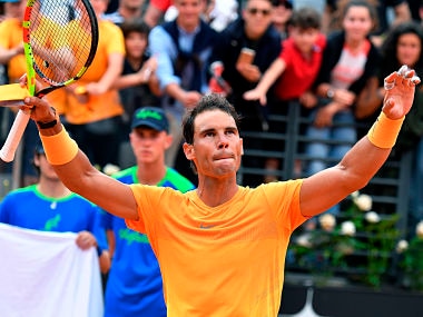 Spain's Rafael Nadal celebrates after winning his match against Bosnia's Damir Dzumhur at the Italian Open tennis tournament in Rome, Wednesday, May 16, 2018. (Ettore Ferrari/ANSA via AP)