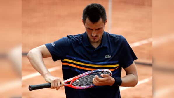 I'm a tennis player, get me out of here: Bernard Tomic lost for words after French Open loss to Marco Trungelliti