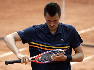 I'm a tennis player, get me out of here: Bernard Tomic lost for words after French Open loss to Marco Trungelliti I'm a tennis player, get me out of here: Bernard Tomic lost for words after French Open loss to Marco Trungelliti