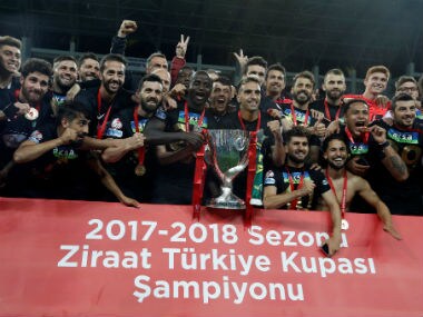 Akhisarspor players and staff celebrate winning the Turkish Cup final with the trophy, Reuters 